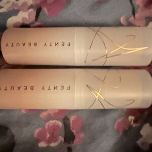 Two Fenty cream foundation sticks in shade 14 & 15. Never used just swatched